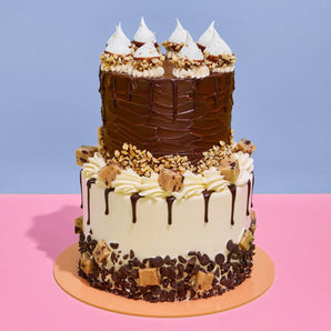 2 Tier Ferrero Rocher & Cookie Dough Cake with chocolate, hazelnuts, cookie dough, and buttercream by Crumbs & Doilies